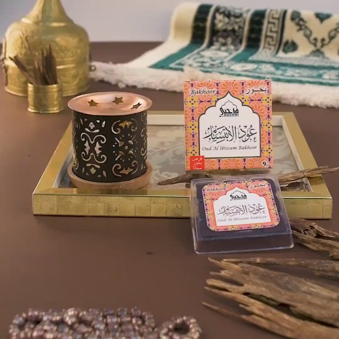 Dukhni Oud Al Ibtisam Bakhoor Arabic incense with a step-by-step guide for burning, perfect for creating a fragrant ambiance in the UK.